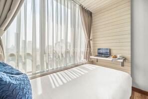 Appartement, 2 chambres, non-fumeur, vue sur la ville | 2 chambres, literie de qualité, ameublement unique, bureau