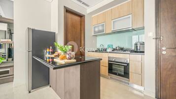 Apartment, 2 Bedrooms, City View | Private kitchen | Fridge, microwave, oven, rice cooker