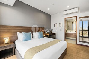 Apartment, 1 Bedroom, City View | 1 bedroom, premium bedding, individually furnished, iron/ironing board