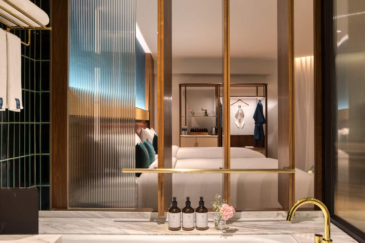 green luxury family (suite) | bathroom | eco-friendly toiletries, hair dryer, bathrobes, slippers