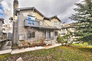A two-story house with a front porch, a visible electrical box, and a mailbox. - On Deer Valley Drive - Easy Walk/Shuttle to Skiing and Main St. (Park City)