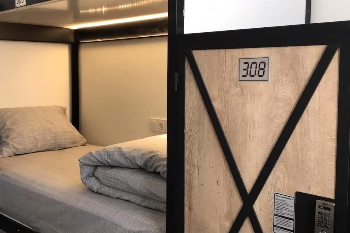 Dormitorio compartido económico | Wifi gratis y ropa de cama