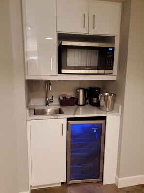 Fridge, microwave, coffee/tea maker, toaster