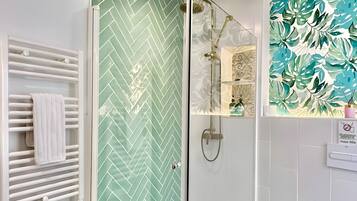 Shower, hair dryer, towels
