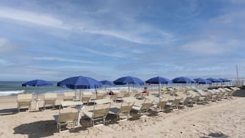 Private beach, white sand, free beach shuttle, sun-loungers