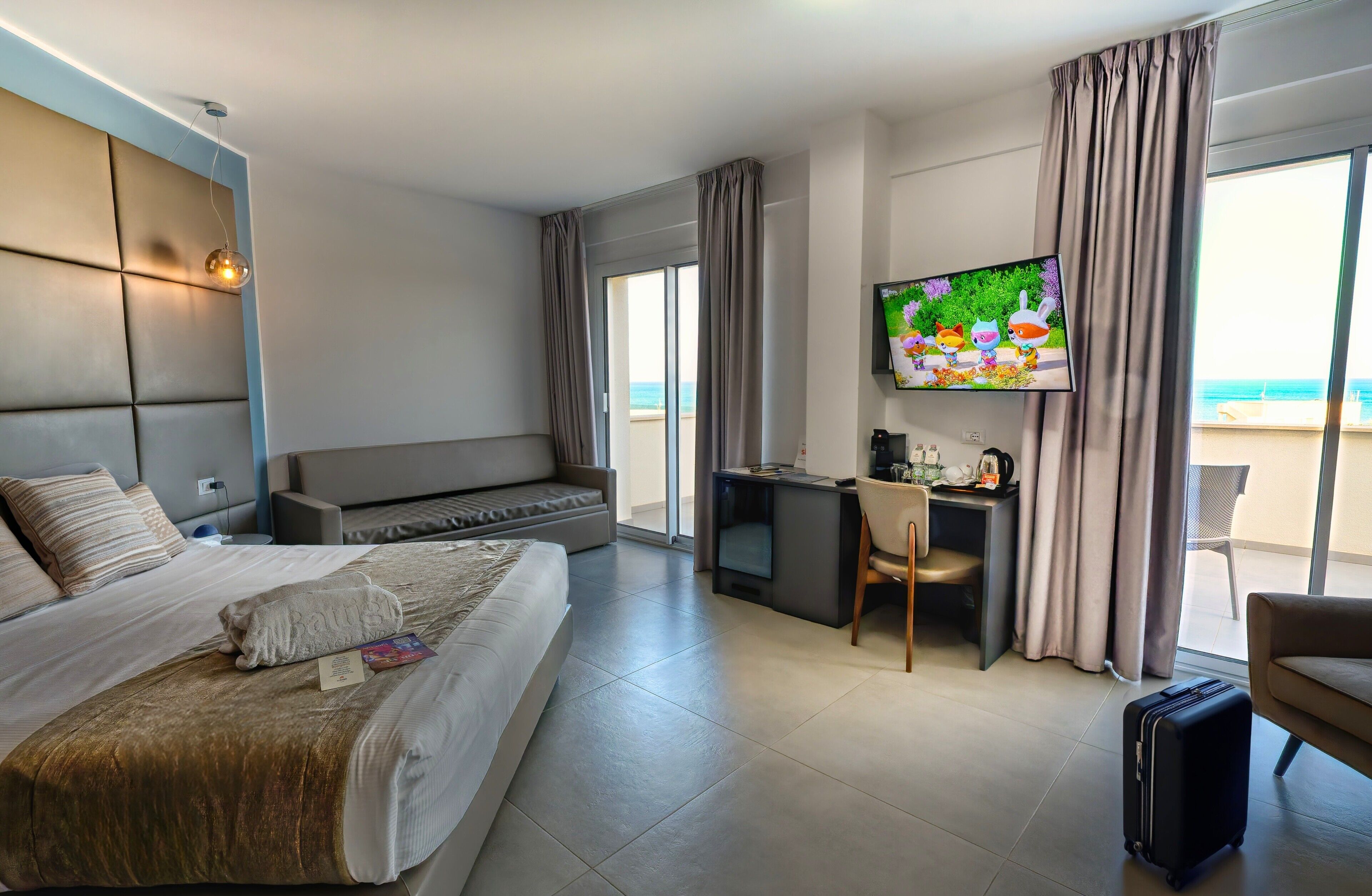 Premium bedding, down comforters, memory foam beds, in-room safe