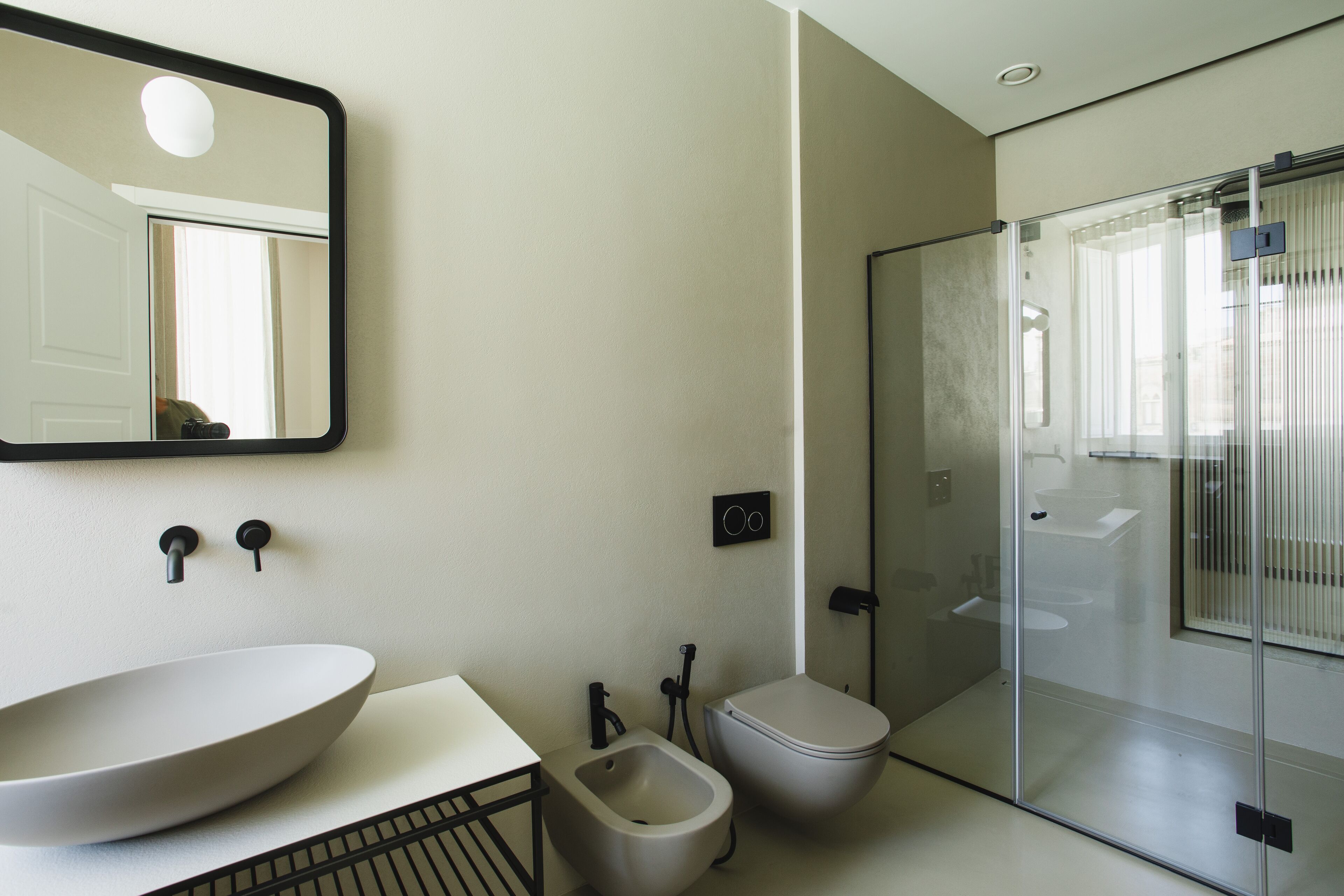 junior studio suite | bathroom | shower, rainfall showerhead, hair dryer, slippers