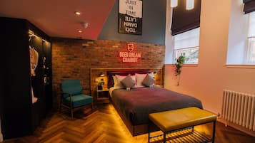 Premium bedding, memory foam beds, free minibar items, in-room safe