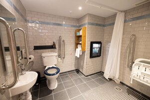 Accessible Punk | Bathroom | Shower, designer toiletries, hair dryer, bathrobes