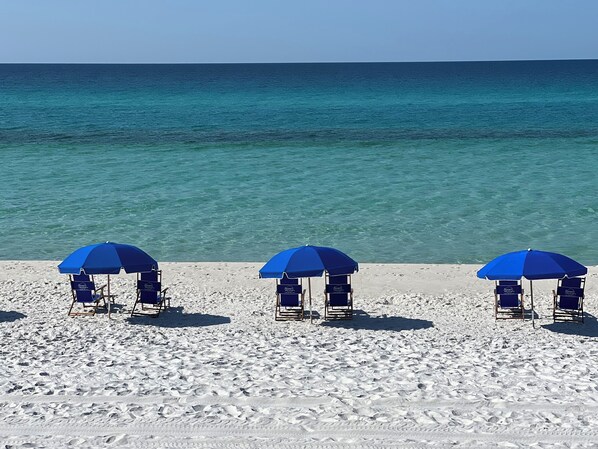 On the beach, sun loungers