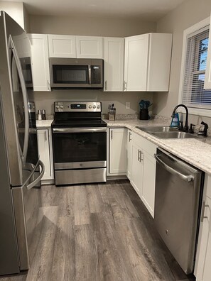 Microwave, oven, stovetop, dishwasher - Modern Spacious home near airport (Bangor dr)