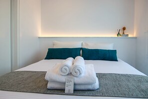 Apartemen Deluks | 3 kamar tidur, setrika/meja setrika, Wi-Fi gratis, dan seprai linen