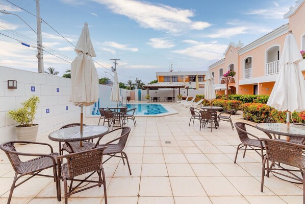 Apartamento | Restaurante al aire libre