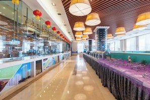 A long, narrow corridor with a polished floor, glass partitions on one side, and a row of purple-covered tables on the other. - Panshan Yinlong Hotel (Panshan)