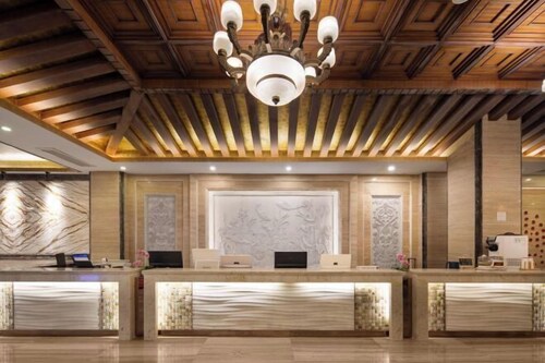 Xinghu Peninsula Hotel (Haikou Provncial Government Sun And mood Duty Free Shop)