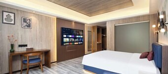 Xinghu Peninsula Hotel (Haikou Provncial Government Sun And mood Duty Free Shop)