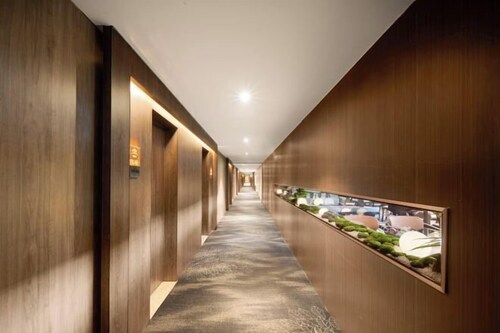 Xinghu Peninsula Hotel (Haikou Provncial Government Sun And mood Duty Free Shop)