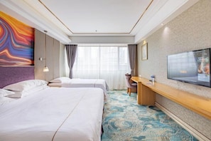 A hotel room with two beds, a desk, a TV, and a large window with curtains. - Foshan Star Hotel (Huili Plaza Store) (Foshan)