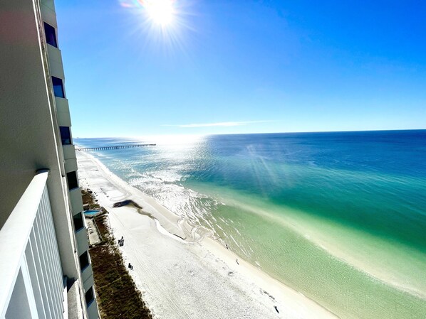 On the beach, sun loungers, beach towels