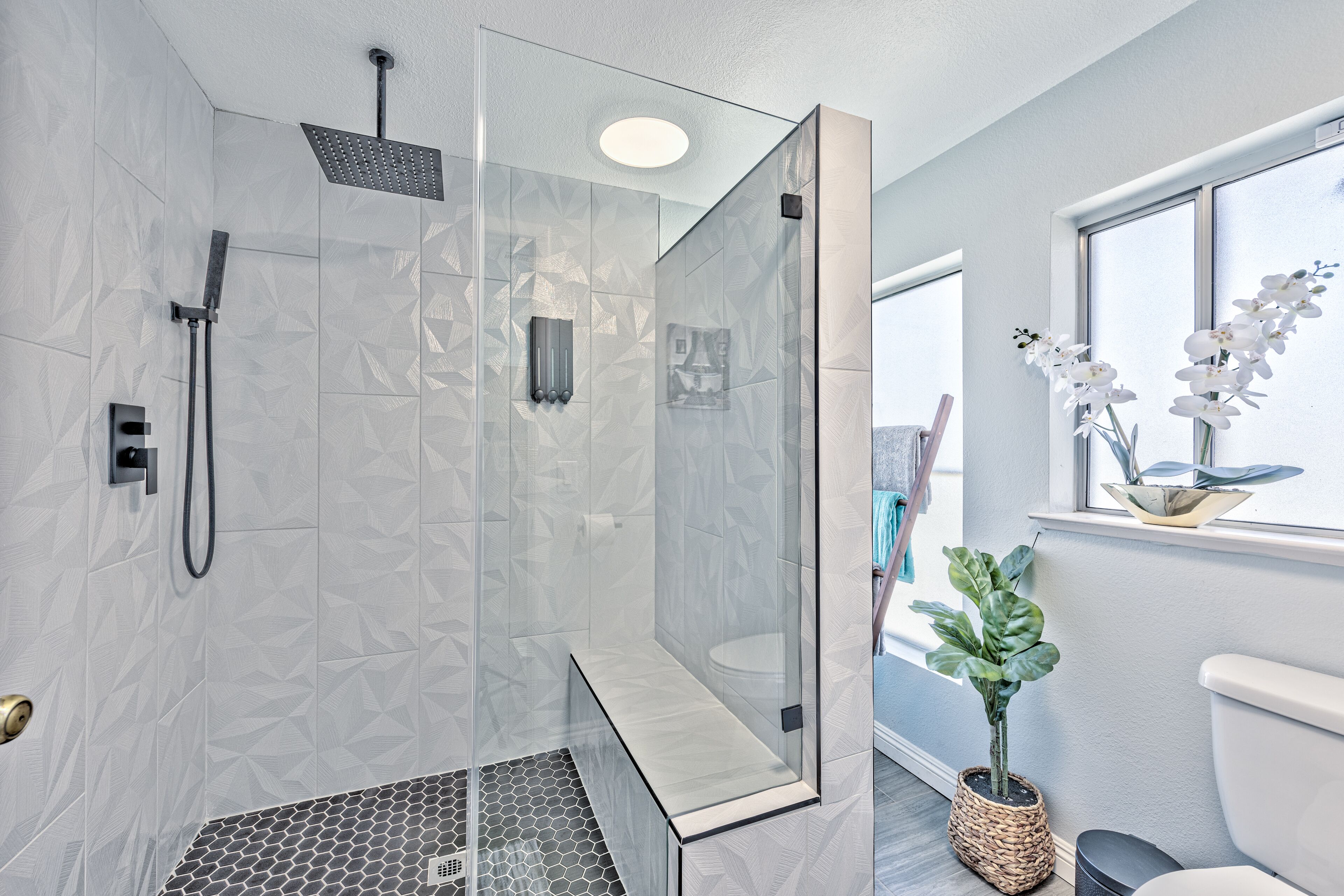 Bathtub, hair dryer, towels, soap