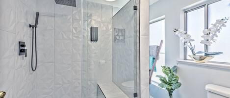 Bathtub, hair dryer, towels, soap