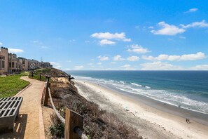 On the beach, sun-loungers, beach towels