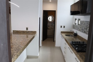 Fridge, microwave, coffee/tea maker, kitchen islands