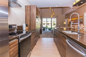 Enjoy cooking in this well-equipped kitchen with an oven and large island.