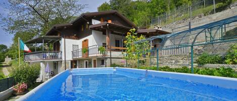 Seasonal outdoor pool, a heated pool