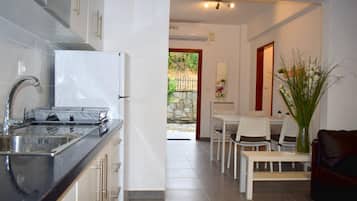 Apartemen | Dapur pribadi | Lemari es, oven, kompor, dan ketel listrik
