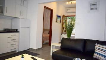 Apartemen | Ruang keluarga | Televisi 30-inci dengan saluran TV kabel