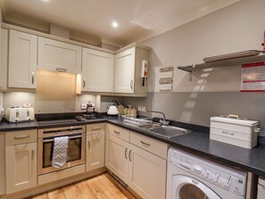 Cottage | Private kitchen | Fridge, electric kettle, toaster, cookware/dishes/utensils - Anchors Down (Whitby)