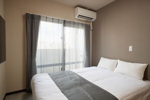 Standard Double Room, Non Smoking | Premium bedding, desk, blackout drapes, free WiFi - New Normal Hotel in MATSUYAMA (Naha)