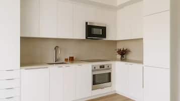 Elite Condo | Living area | 40-inch flat-screen TV with digital channels, TV