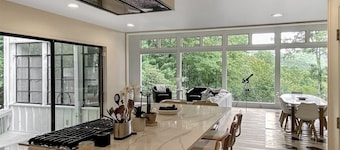 Above the Rhododendrons. Below the Storm Clouds. Exactly Where You Need to Be | The Tree House