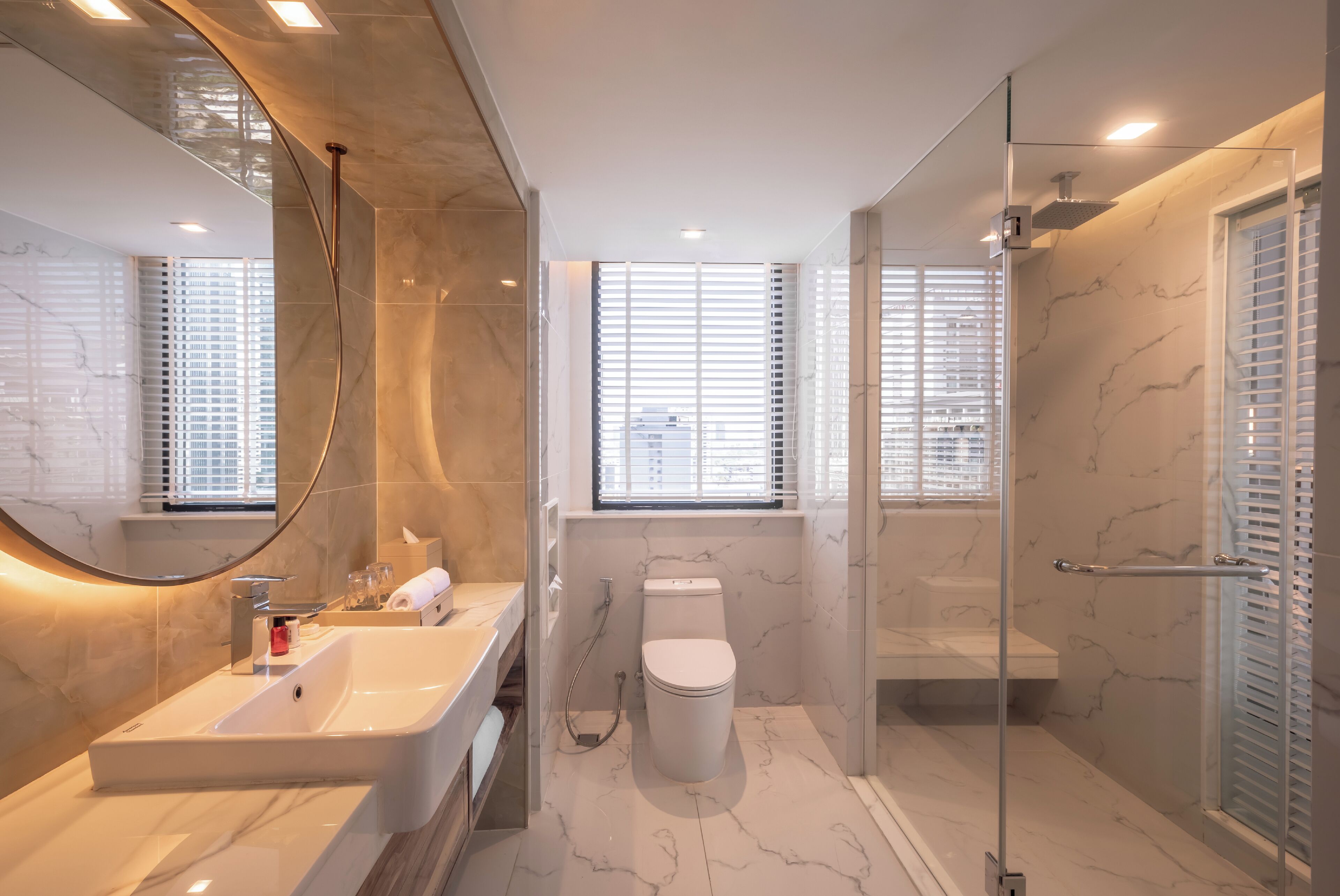 rainfall showerhead, hair dryer, bathrobes, slippers