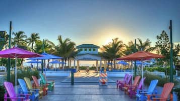 Relax in a tropical setting with comfortable seating and shade.