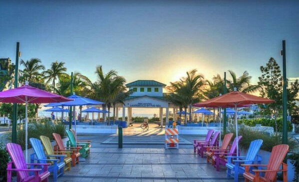 Relax in a tropical setting with comfortable seating and shade.