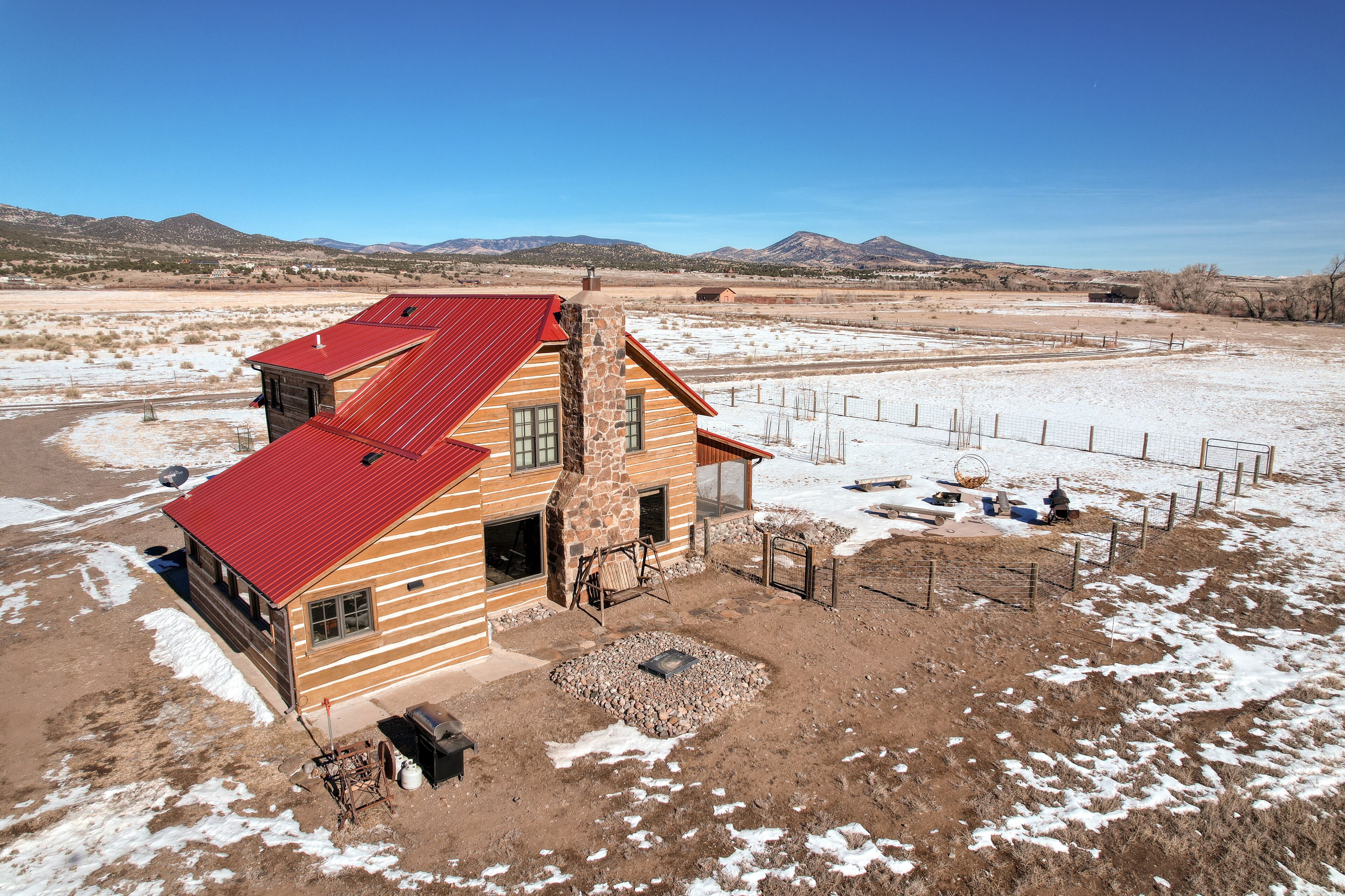 Dog-friendly riverfront retreat with hot tub, stunning views & screened porch