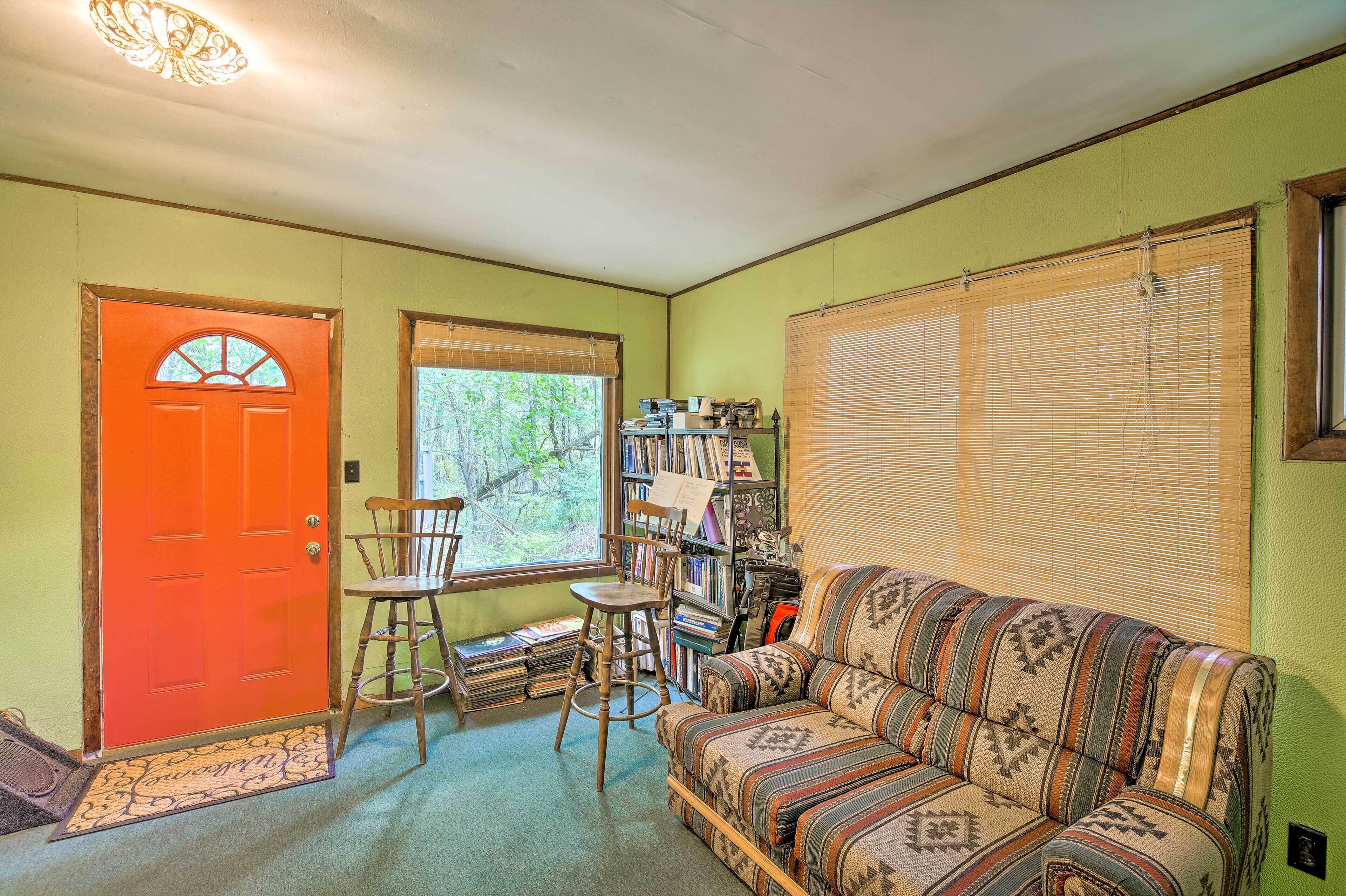 TV, fireplace, books, offices