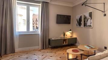 Superior Apartment | Living room | Flat-screen TV