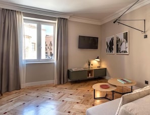 Departamento superior | Sala de estar | Televisión de pantalla plana