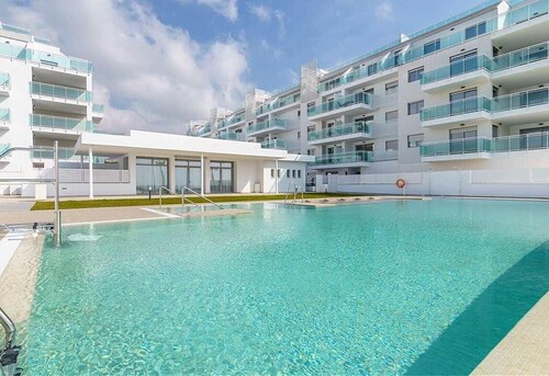 Bright Beach Apartment with Sea and Mountain Views