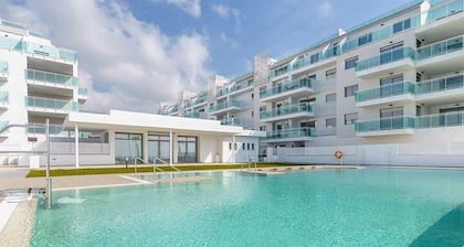 Bright Beach Apartment with Sea and Mountain Views
