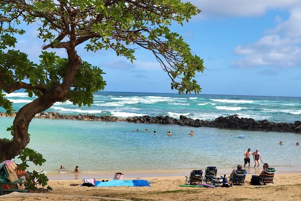 On the beach, sun loungers, beach towels