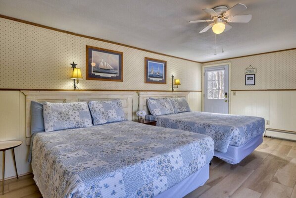 1 bedroom, desk, iron/ironing board, travel crib