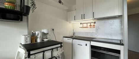 Fridge, microwave, coffee/tea maker, toaster