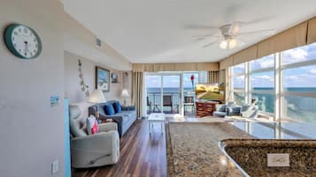 Deluxe Condo, 2 Bedrooms, Non Smoking | Living room | 55-inch Smart TV with cable channels