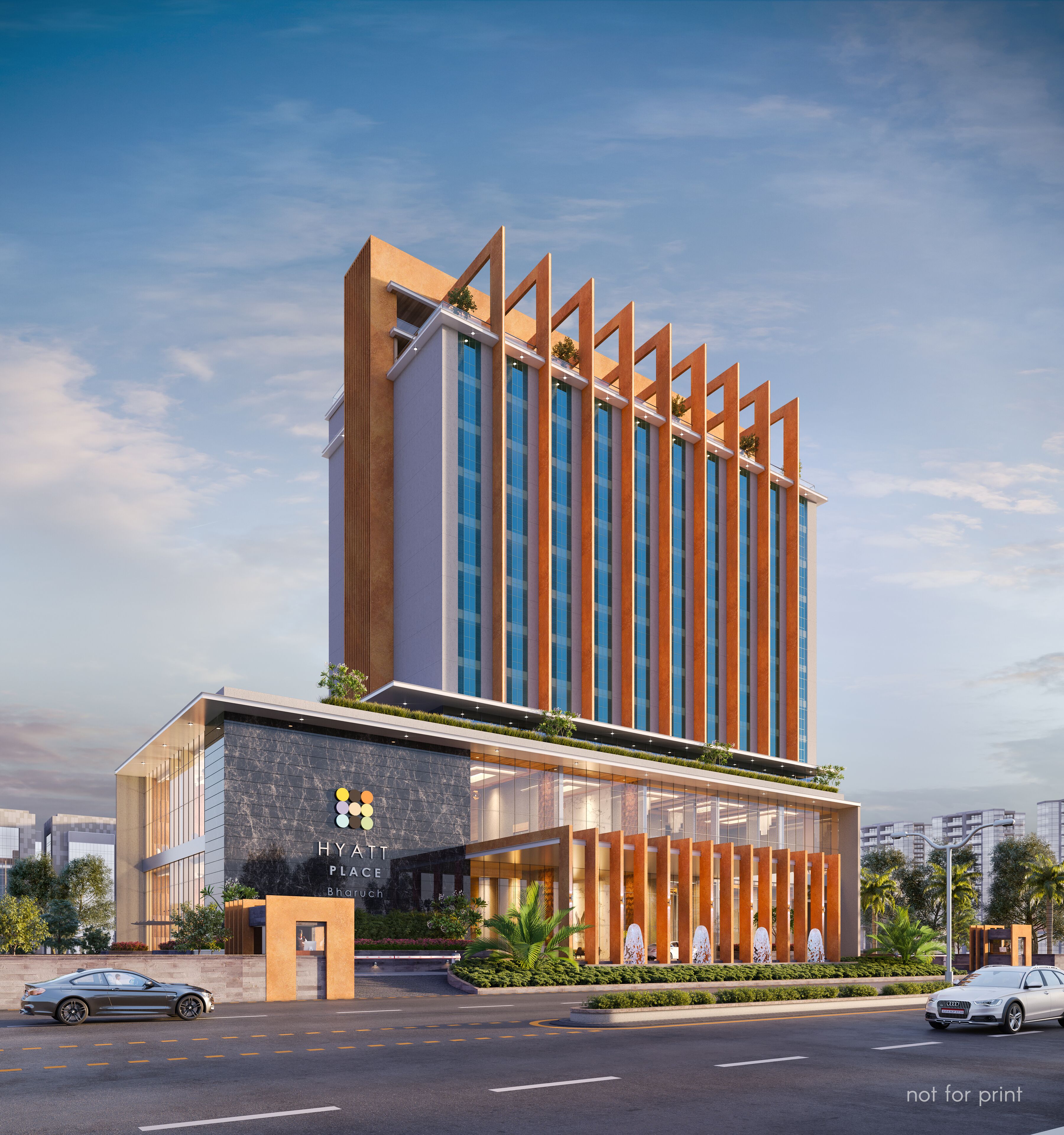 A modern hotel with a prominent vertical design, large windows, and a well-maintained entrance area.