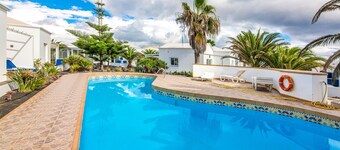 A3, in a small complex with communal heated pool 100m from the sea